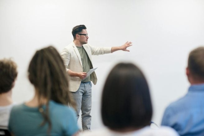 a trainer in front of students
